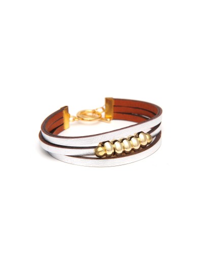 bracelet en cuir et pièces en métal doré